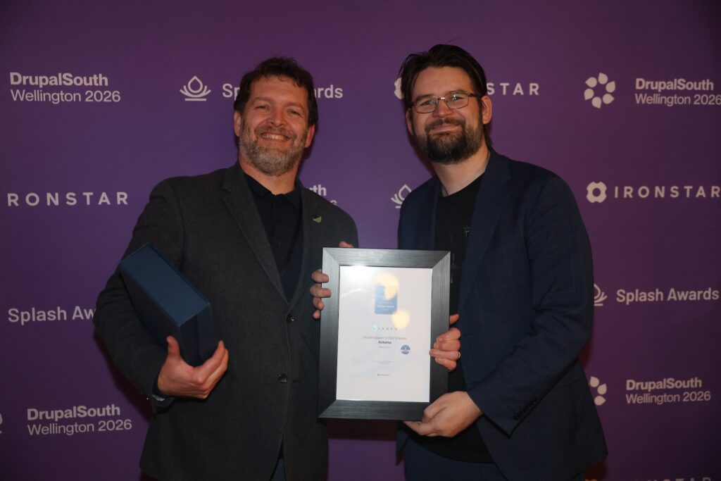 Breccan and Josh pose with open source award certificate